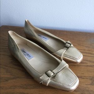 Jimmy Choo gold flats / loafers